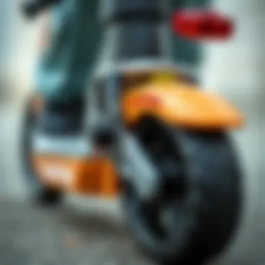 Close-up of Twister Maxi Scooter's safety features including brakes and wheels